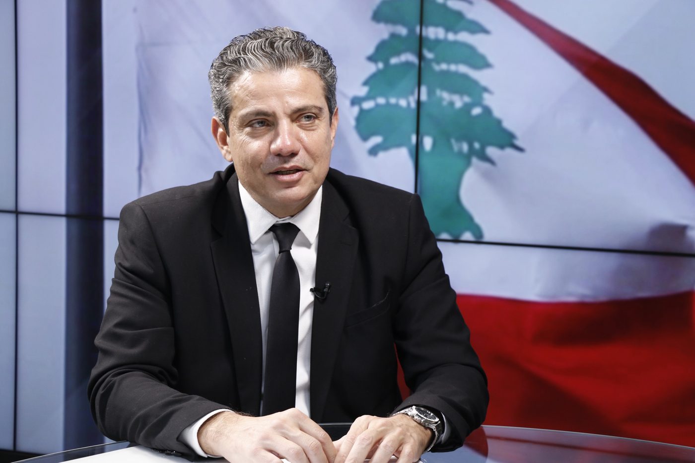 Judge Peter Germanos in a television studio